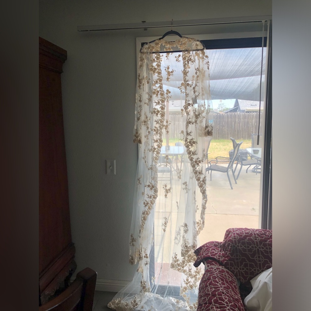 Never used wedding dress cover up with trail
